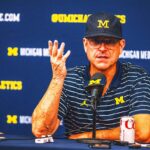 Jim Harbaugh, Michigan players calm amid the storm of investigation